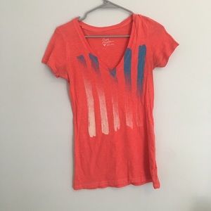 Red V neck American Eagle t-shirt.